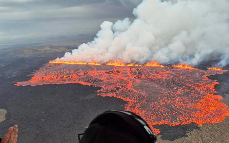 Smoke, flames and lava viewed from above.