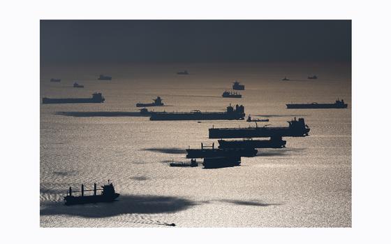 Bulk carriers offshore from Singapore, on Monday, Feb. 19, 2024. MUST CREDIT: SeongJoon Cho/Bloomberg