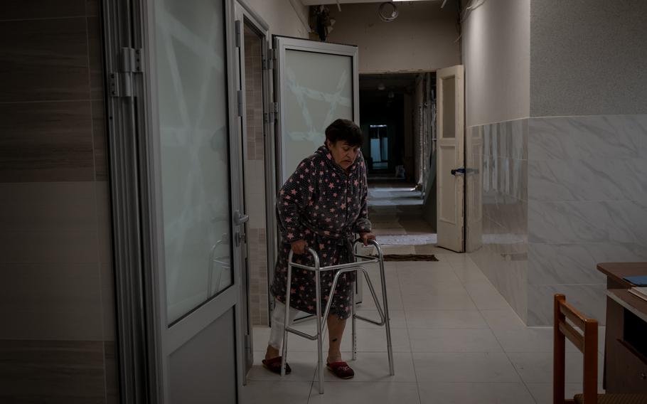 In a hospital in Donbas on Victory Day, Ludmila Krivanos recovers. She and her husband were injured in a Russian strike near their home in Drobysheve.
