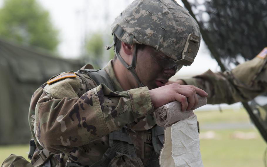 Pfc. Felix Rosario Acosta, 21, a human resources specialist with 38th Air Defense Artillery Brigade at Sagami General Depot, Japan, was among those who earned an Expert Soldier Badge, Friday, April 22, 2022.