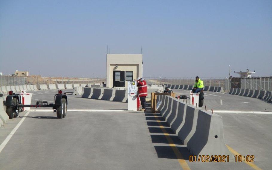 An entry control point at an installation determined to be Muwaffaq Salti Air Base in Jordan. Construction projects at the base included one worth $18 million to build roads, guard gates, sewage systems and three water wells.