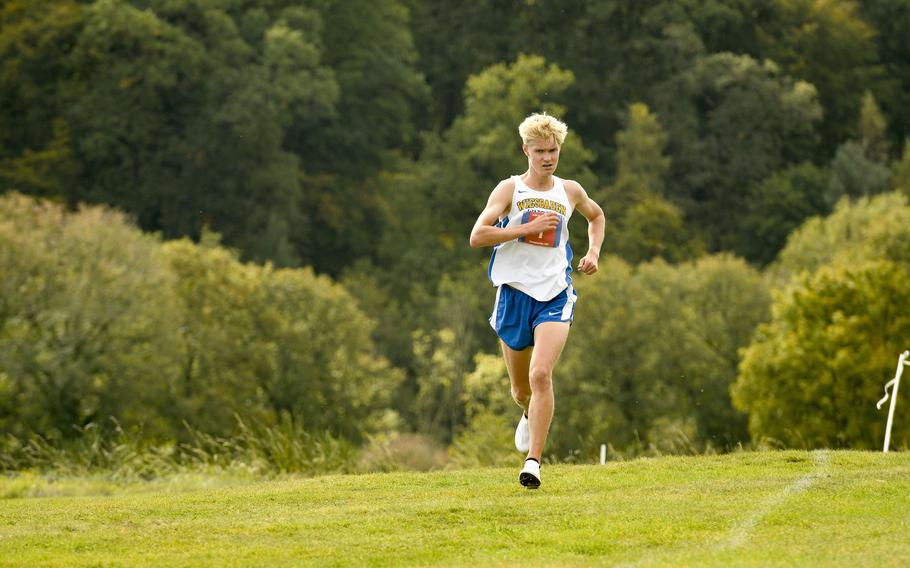 Wiesbaden junior Luke Jones pulls away in the final lap of the boys DODEA-Europe cross country championship race Oct. 21, 2023, in Baumholder, Germany. Jones is the favorite in two events at the track and field championships Thursday and Friday and has the second-best time in a third.