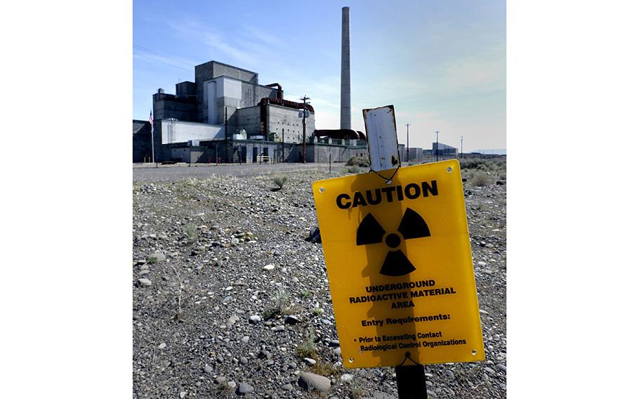 Signs remind visitors approaching the B Reactor on the Hanford Nuclear Reservation in south-central Washington in 2016.
