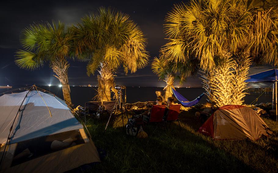 Visitors camp overnight at Rotary Riverfront Park to watch the Artemis I launch in Titusville on Aug. 29, 2022.