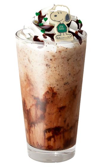 Snoopy and friends adorn a variety of Starbucks merchandise, including a frozen coffee beverage, sweets, drinkware, gift cards, T-shirts and hats. 