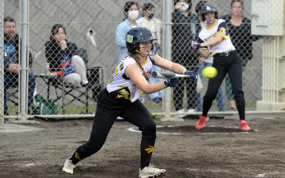 Kadena's Emaleigh Appleton drops a sacrifice bunt against Kubasaki during Tuesday's Okinawa softball game. The Panthers won 5-3.