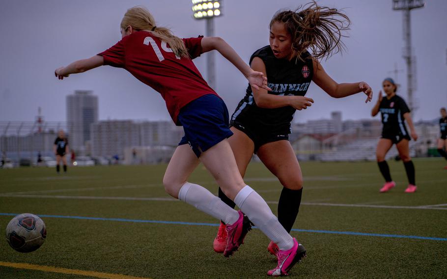 Emily Ploch gets past Ella Calla.