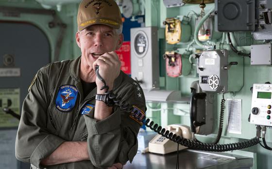 Vice Adm. Karl Thomas, commander of the 7th Fleet, speaks to the crew of the mine countermeasures ship USS Pioneer at Sasebo Naval Base, Japan, June 9, 2022.