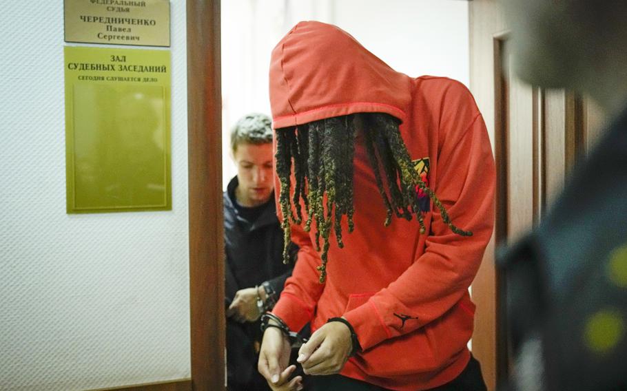 WNBA star and two-time Olympic gold medalist Brittney Griner leaves a courtroom after a hearing, in Khimki just outside Moscow, Russia, Friday, May 13, 2022. Griner, a two-time Olympic gold medalist, was detained at the Moscow airport in February after vape cartridges containing oil derived from cannabis were allegedly found in her luggage, which could carry a maximum penalty of 10 years in prison.
