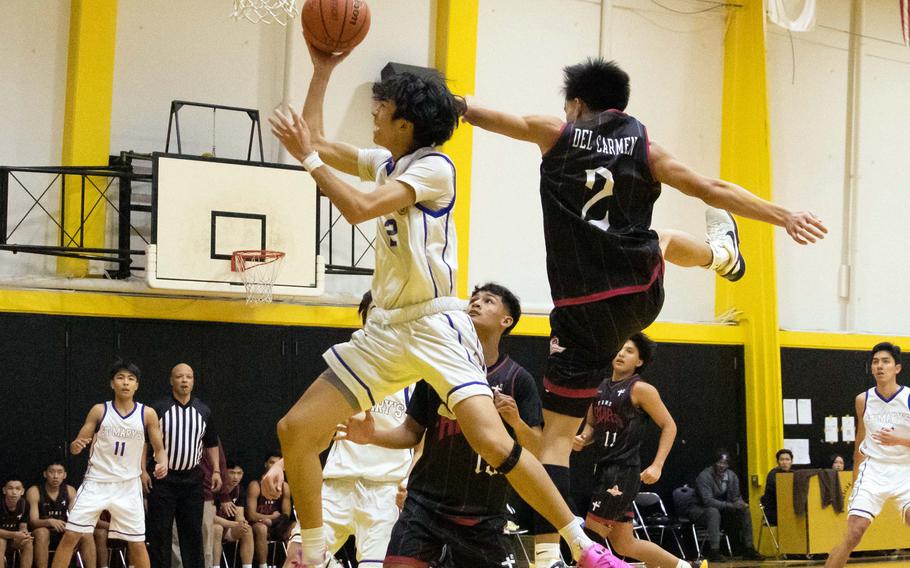 Tow Miyoshi puts up a shot.