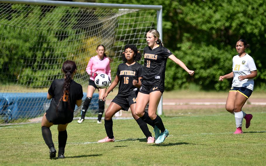 Spangdahlem defender Amaya Hutchinson, center left, and midfielder Kylie McVey position themselves to block a ball during the second day of round-robin action against Ansbach at the 2025 Division III DODEA European championships on May 20, 2025, at Rothenborn Stadion in Landstuhl, Germany.