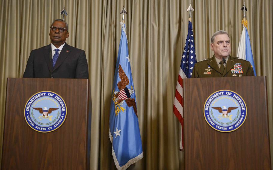U.S. Defense Secretary Lloyd Austin Army Gen. Mark Milley, chairman of the Joint Chiefs of Staff, give closing remarks at the 11th Ukraine Defense Contact Group meeting April 21, 2023, at Ramstein Air Base in Germany.