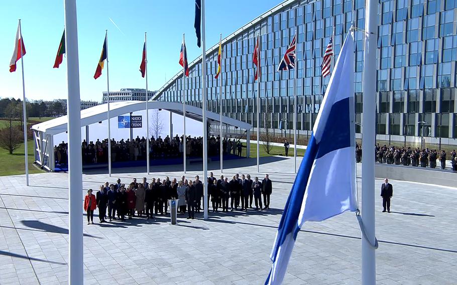 Finland's flag is raised at NATO headquarters in Brussels, April 4, 2023, as the Nordic country becomes the alliance's 31st member.