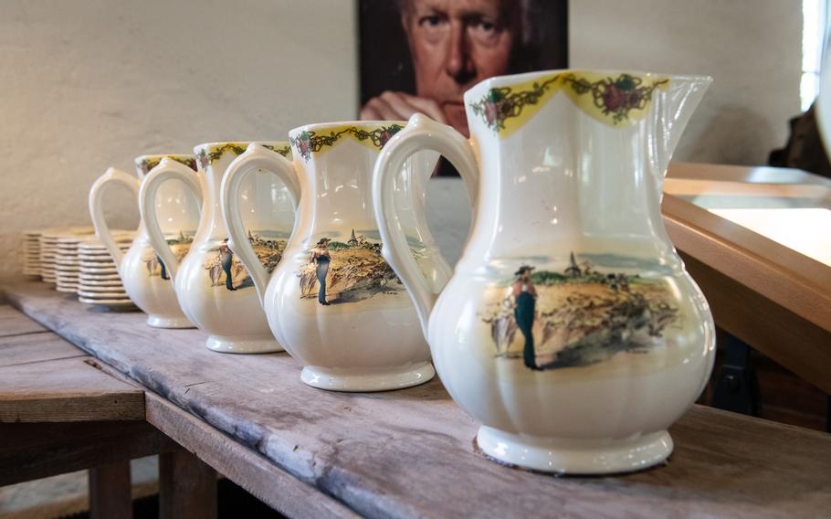 Ceramic pitchers sit in a row at the Museum of Faience Techniques in Sarreguemines, France.