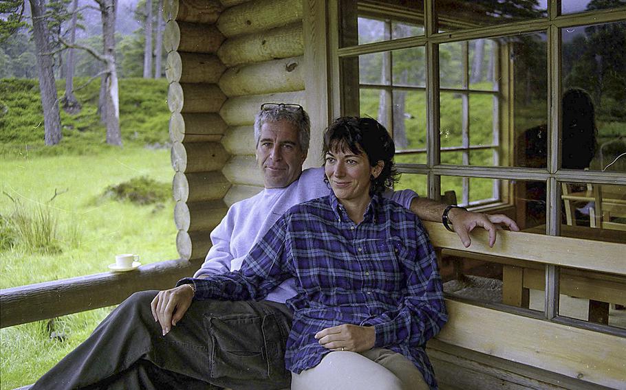 Jeffrey Epstein and Ghislaine Maxwell at the Queen’s log cabin at Glen Beg, Balmoral, Scotland, was recovered during an FBI raid at Epstein’s Upper East Side mansion in 2019 and entered into evidence on Dec. 7, 2021. 