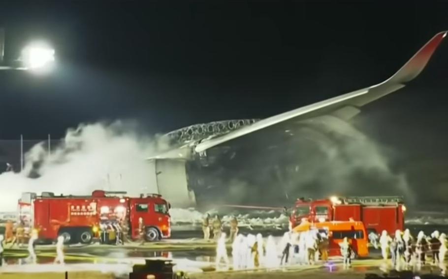 A large passenger plane and a Japanese coast guard aircraft collided on the runway at Tokyo’s Haneda Airport on Tuesday and burst into flames, killing five people aboard the coast guard plane.