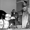 Kaiserslautern, Germany, Oct. 12, 1954: Jazz singer Sarah Vaughan, accompanied by famed jazz drummer Roy Haynes on stage in Kaiserslautern. The stop was one of many on Vaughan's European tour. The singer is hitting 23 major cities in as many days, but did have time for a quick chat with Stars and Stripes reporter Robert Dunphy. Check out the interview here. 
https://www.stripes.com/migration/from-the-s-s-archives-real-gone-miss-vaughan-1.66156

If you dig jazz, be sure to dig into Stars and Stripes Historic newspaperarchives this Jazz Appreciation Month! We have digitized our 1948-1999 European and Pacific editions, as well as several of our WWII editions and made them available online through https://starsandstripes.newspaperarchive.com/

META TAGS: Jazz Appreciation month; Jazz; music; percussion; 