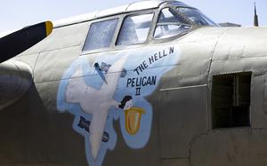 Crew members painted the Douglas A-20 Havoc bomber Hell’N Pelican II with an image of a pelican carrying a bomb. 