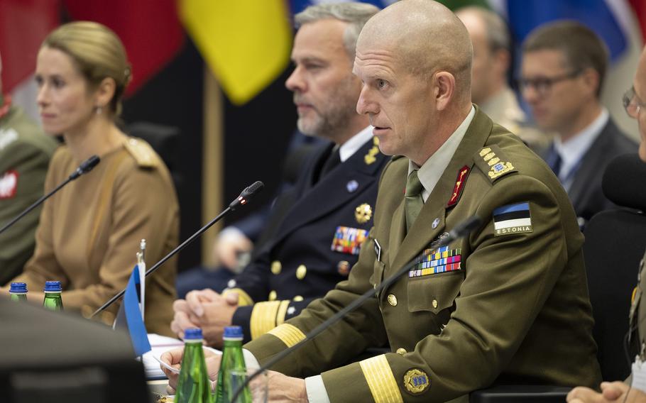 Estonian Lt. Gen. Martin Herem, chair of the NATO Military Committee, Dutch Adm. Rob Bauer and Estonian Prime Minister Kaja Kallas, from right, listen during opening remarks at the the NATO Military Committee Conference in Tallinn, Estonia, Sept. 17, 2022.