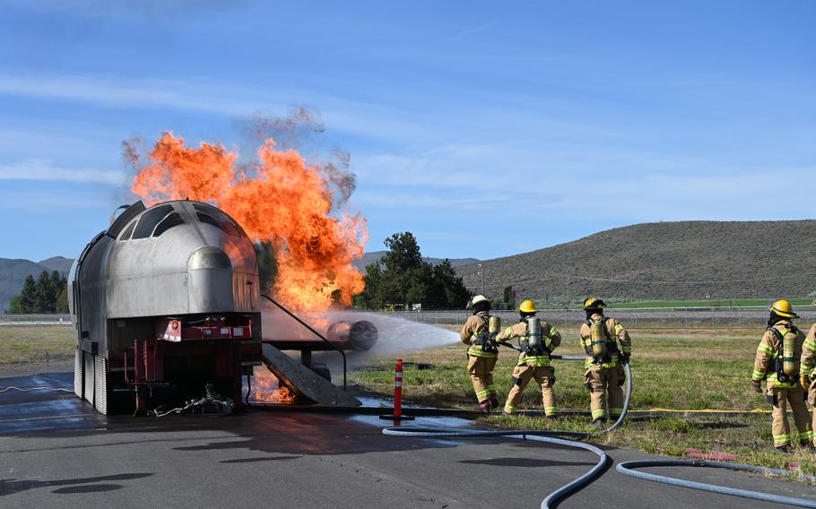 Troops at Kingsley Field Air National Guard Base fight a fire on an aircraft fuselage mock-up during training at the Oregon base in 2020. Oregon Attorney General Ellen Rosenblum has sued companies that made PFAS-laden foam used at Kingsley Field. A bill proposed in Congress would compensate military firefighters for illnesses caused by the chemicals. 