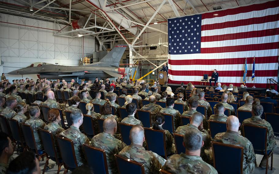 Members of the 138th Fighter Wing attend a Distinguished Flying Cross ceremony at the Tulsa Air National Guard Base in Oklahoma on Dec. 5, 2021. The medal was awarded to Lt. Col. Michael Coloney.