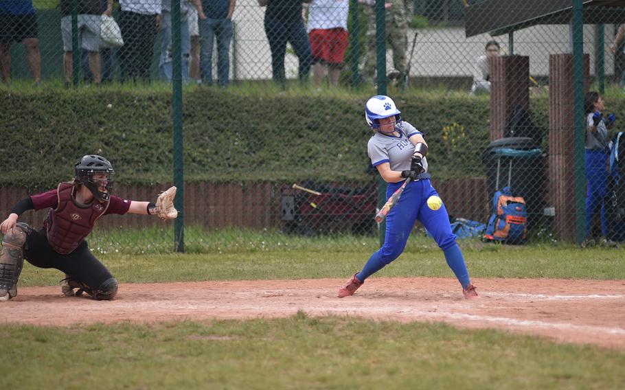 Ramstein junior Maddie Mihalic hits the ball during a Division I DODEA European softball semifinal against Vilseck on Ramstein Air Base, Germany.