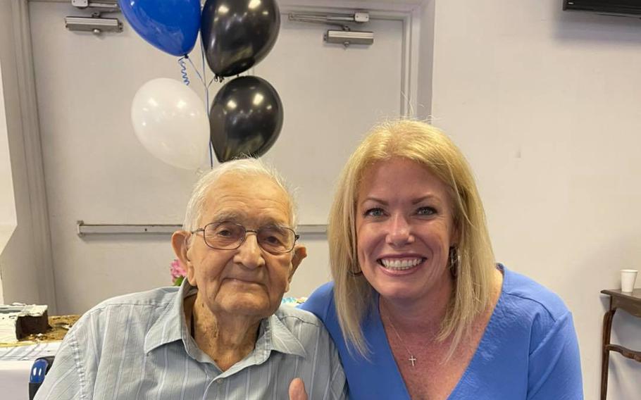 World War II veteran Edward Elrod with Delaware state Sen. Nicole Poore at his 100th birthday celebration.