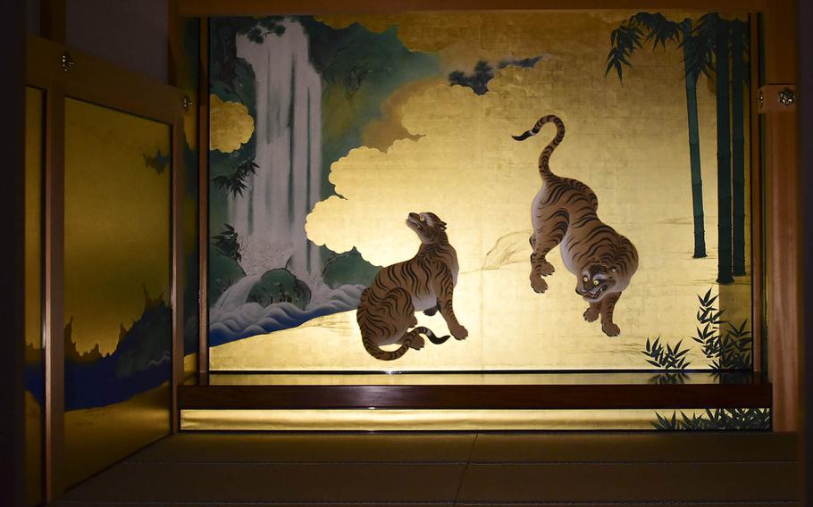 Screen-painted tigers, dragons, cranes and other art grace the walls of Honmaru Palace in Nagoya, Japan, with vibrant colors. 