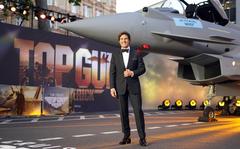 Tom Cruise poses for the media during the 'Top Gun Maverick' UK premiere at a central London cinema, on Thursday, May 19, 2022. 