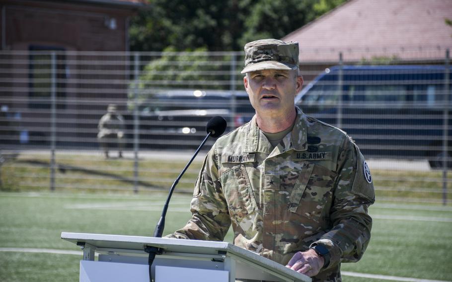 Brig. Gen. Clinton Murray speaks to troops after assuming command of U.S. Army Regional Health Command Europe in a ceremony in Landstuhl, Germany, June 1, 2022.