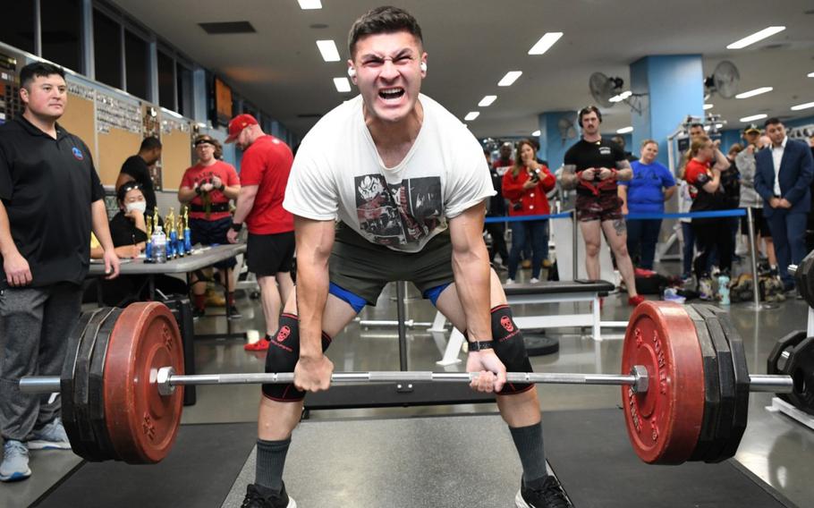 A competitor participates in the “SWOLE Push and Pull” bench press and deadlift competition inside Yano Fitness Center at Camp Zama, Japan, Dec. 6, 2023. The event was part of the Commander’s Cup program, which the U.S. Army Garrison Japan team recently won for the third year in a row.