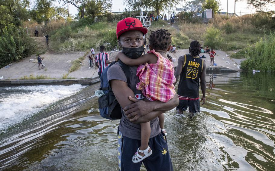 Haitian migrants in the Rio Grande at the U.S.-Mexico border. 