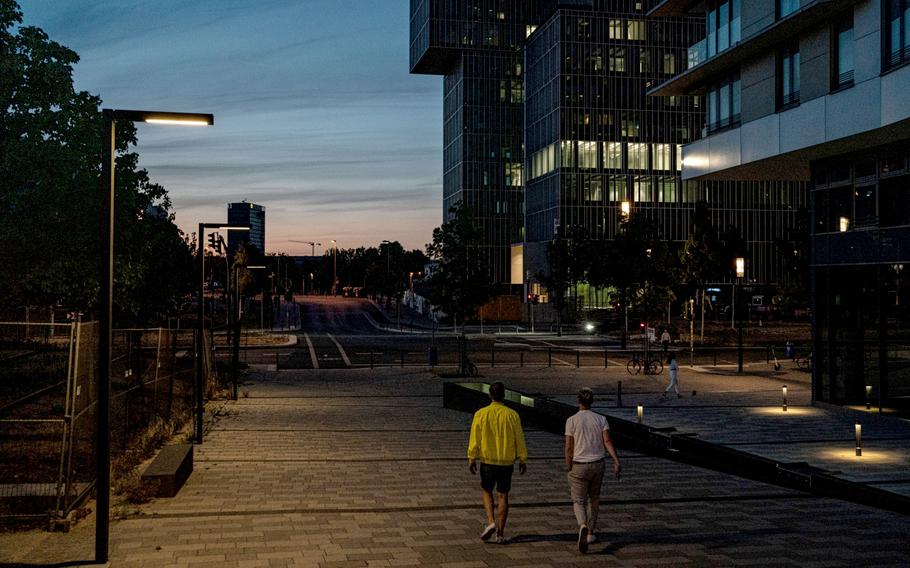 A partially lit office building at night in Frankfurt, Germany, on July 27, 2022. Germany is set to bring some coal plants back online to keep the lights on this winter while higher power prices are contributing to record inflation and squeezing consumers as they struggle with higher bills. 