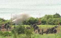 Taiwan's military conducts artillery live-fire drills at Fangshan township in Pingtung, southern Taiwan, Tuesday, Aug. 9, 2022. 