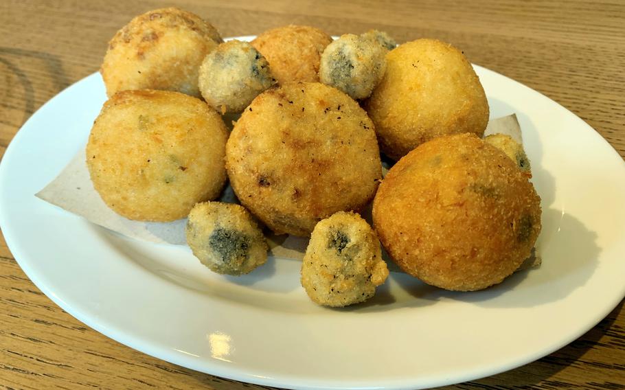 The Sicilian-style fritto misto from Pizzaria Gelateria Razzo in Yokohama, Japan, includes fried arancini and olives.