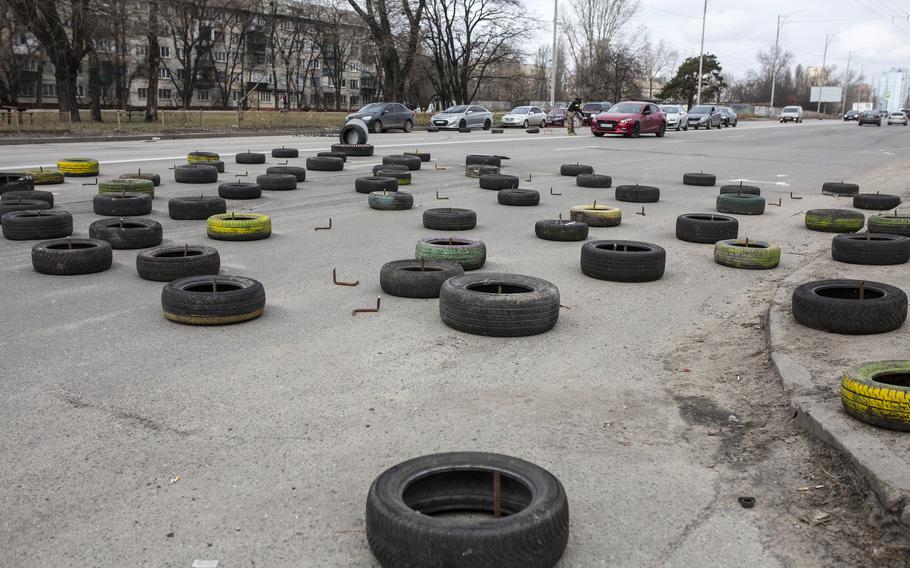 Tires set out at a Kyiv checkpoint operated by Ukrainian territorial defense forces, seen on March 6, 2022.