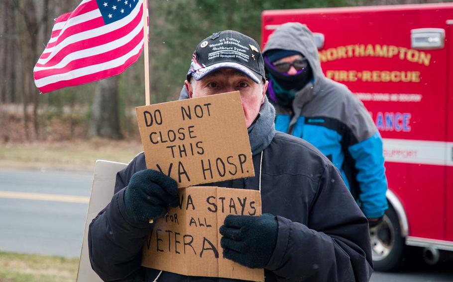 Dozens of elected officials, veterans and nurses turned out to protest the potential closure of a Veterans Affairs hospital in Northampton, Mass., on March 28, 2022.