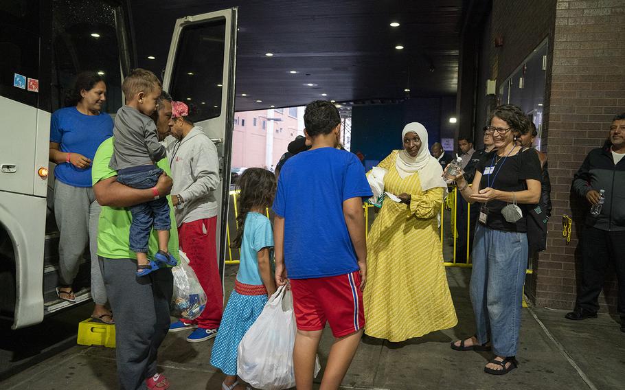 Migrants arrive on a bus at the Port Authority from Texas Thursday, Sept. 22, 2022 in Manhattan. 