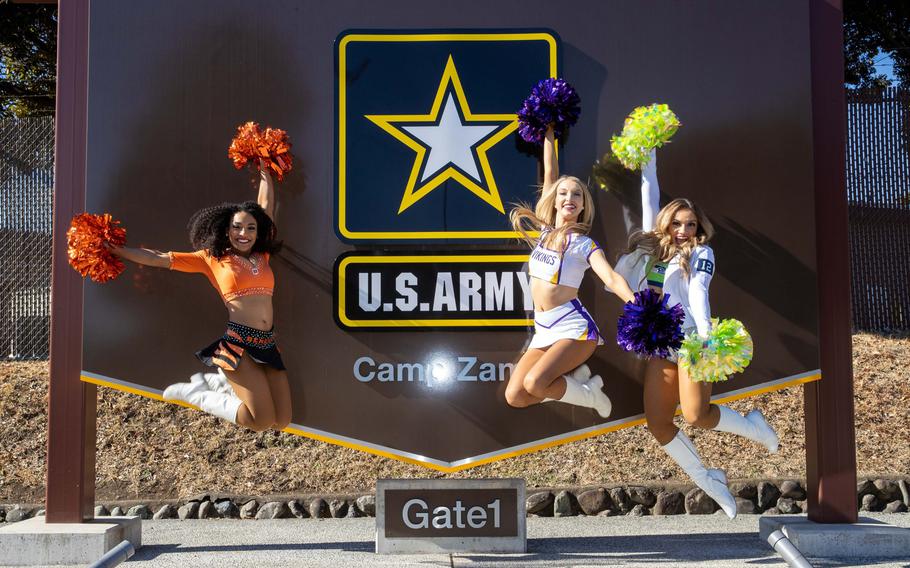 Cheerleaders from the Cincinnati Bengals, Seattle Seahawks and Minnesota Vikings pose at Camp Zama, Japan, Feb. 12, 2024. 