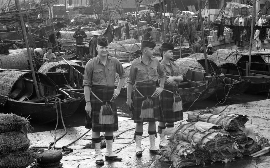 Hospitalman 2C Tom Zugsay (left) of Taipei Headquarters Support Activity (HSA) and Yoeman Frank Harris (middle) also of HSA play Scottish soldiers in the movie “The Sand Pebbles,” which was being filmed on Taiwan.