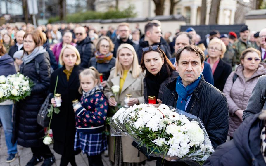 Lithuanians gather outside the U.S. Embassy in Vilnius.