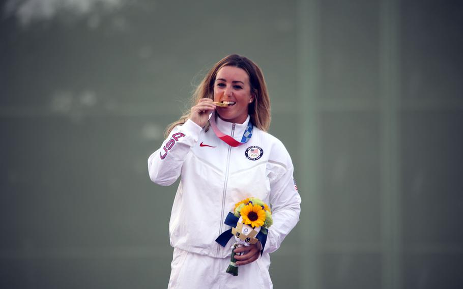 First Lt. Amber English, a logistics officer and member of the Army Marksmanship Unit, celebrates her gold-medal win in women’s shotgun skeet at Camp Asaka, Japan, Monday, July 26, 2021. 