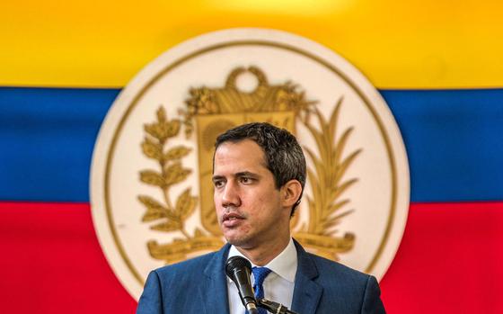 Juan Guaido, president of the National Assembly who swore himself as the leader of Venezuela, speaks during a news conference in Caracas, Venezuela, on Nov. 22, 2021. 