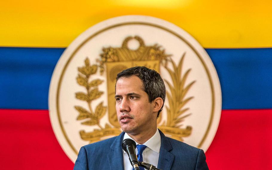 Juan Guaidó, then-president of the National Assembly who swore himself as the leader of Venezuela, speaks during a news conference in Caracas, Venezuela, on Nov. 22, 2021. 