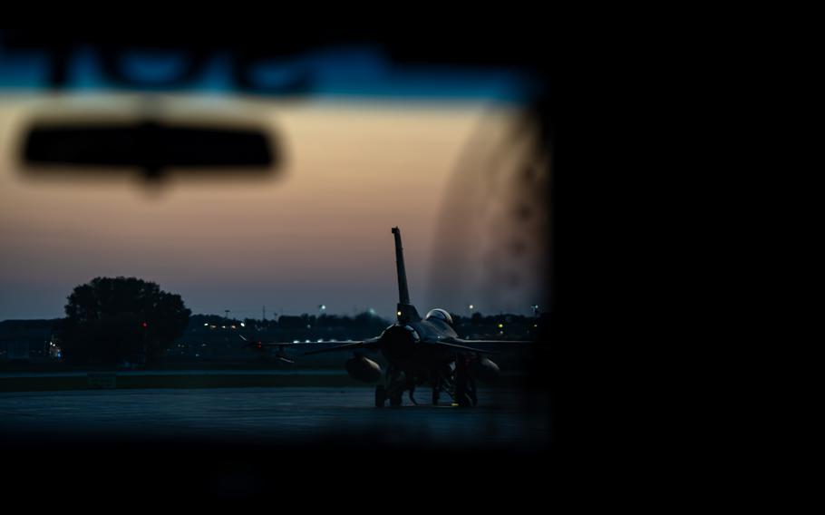An aircraft is seen on a runway.