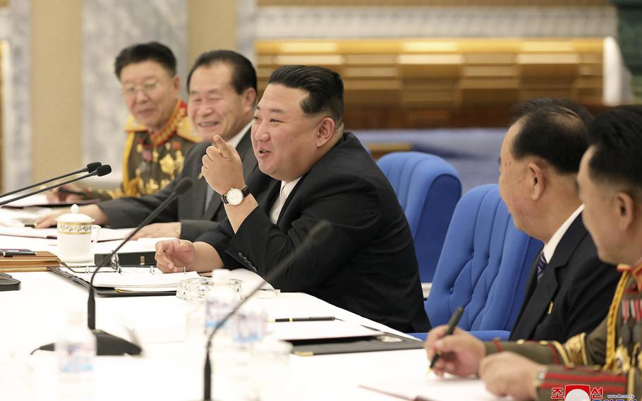 This photo provided by the North Korean government shows North Korean leader Kim Jong Un, center, attends a meeting with his senior military officials at undisclosed location, North Korea, Tuesday, June 21, 2022. 
