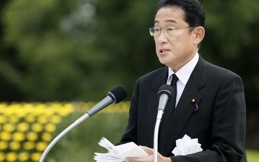 Japan’s Prime Minister Fumio Kishida delivers a speech during the ceremony marking the 77th anniversary of the Aug. 6 atomic bombing in the city, at the Hiroshima Peace Memorial Park in Hiroshima, western Japan Saturday, Aug. 6, 2022. 
