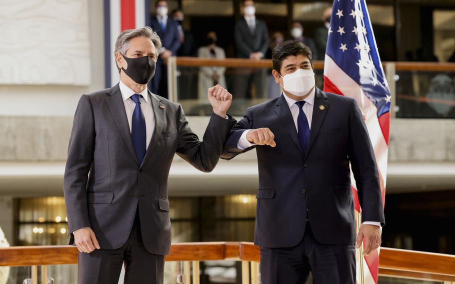 U.S. Secretary of State Antony Blinken and Costa Rica’s President Carlos Alvarado elbow bump after a news conference Tuesday, June 1, 2021, in San Jose, Costa Rica.  