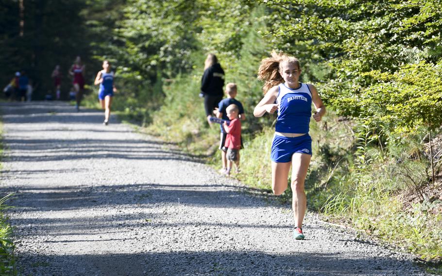 Brenna Mack, 16, a junior at Ramstein, finishes as the winner of the high school girls’ varsity cross country race Saturday, Sept. 18, 2021, in Kaiserslautern, Germany.