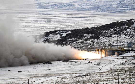 Test fire of a launch vehicle engine while firmly attached to launch mount at Northrop grumman Promontory. Test engine start up while measuring pressure, temperature, and propellant-flow gradients.  (U.S. Air Force photo by R. Nial Bradshaw)